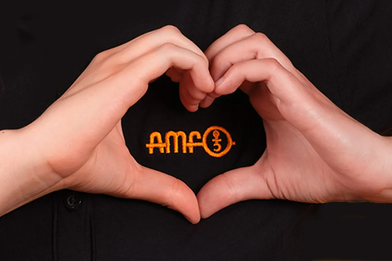 H&auml;nde formen ein Herz um das AMF-Logo &ndash; ein Zeichen f&uuml;r Wertsch&auml;tzung und Zusammenhalt