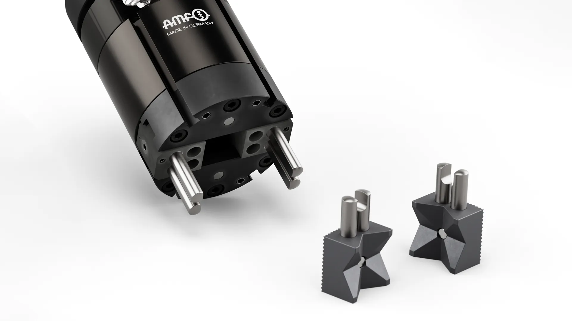 Préhenseur hydraulique et pneumatique avec inserts interchangeables